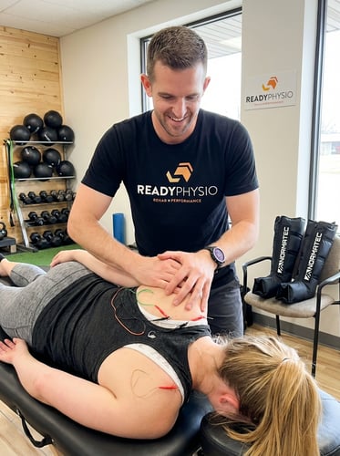  Patient working with a provider at a physical therapy clinic in New Century